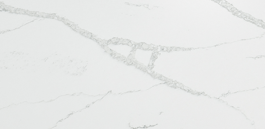 Calacatta Verona Quartz Countertop with White Background and Soft Gray Veining in Kitchen
