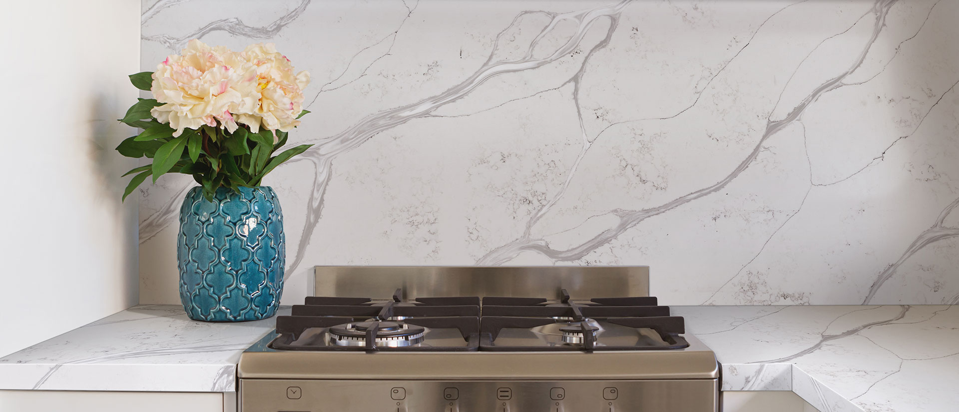 Calacatta Bolina quartz countertop in a bright modern kitchen