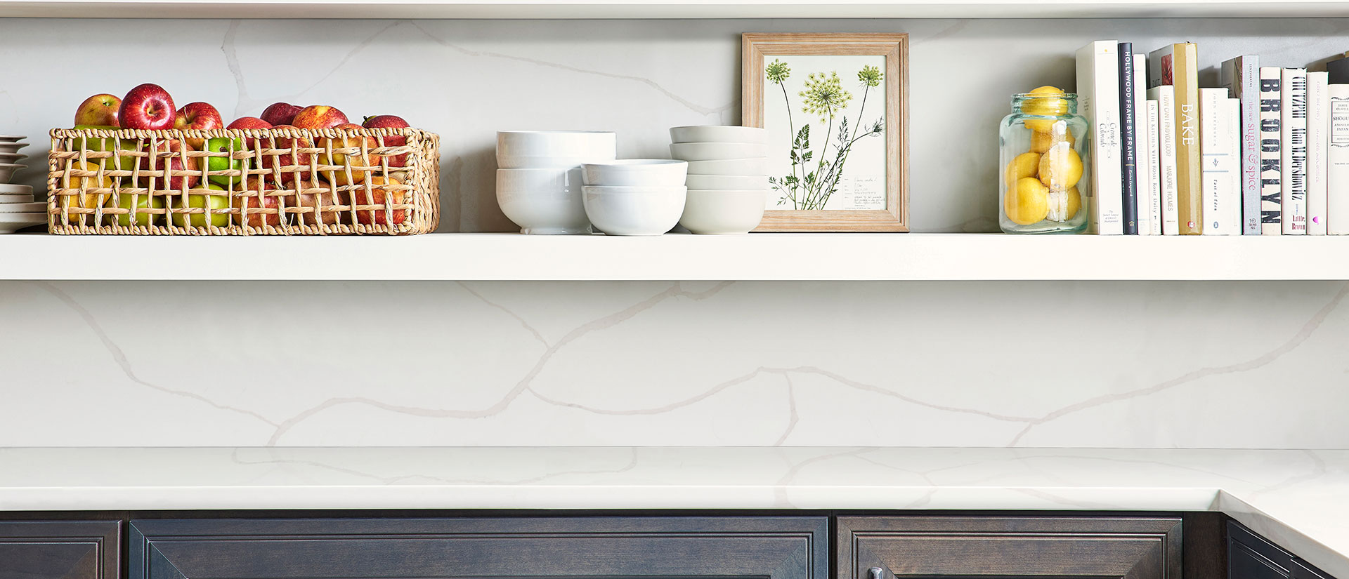 Calacatta Classique quartz countertop in a luxurious kitchen with golden accents