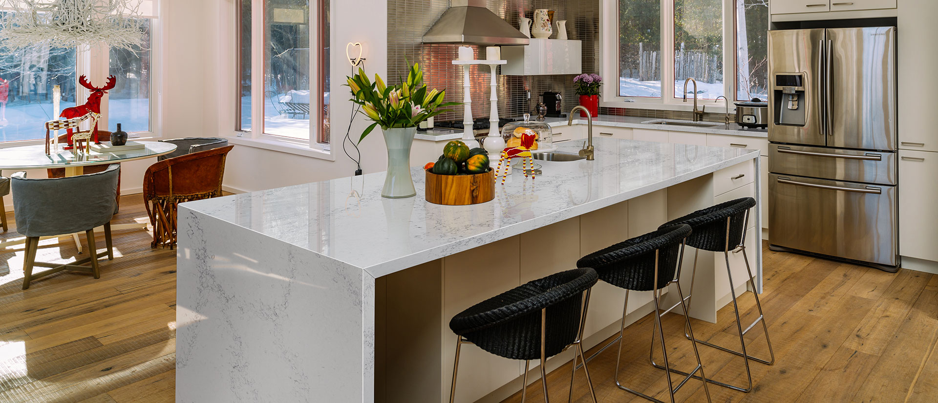 Calacatta Ida quartz countertop in a chic kitchen with wooden accents