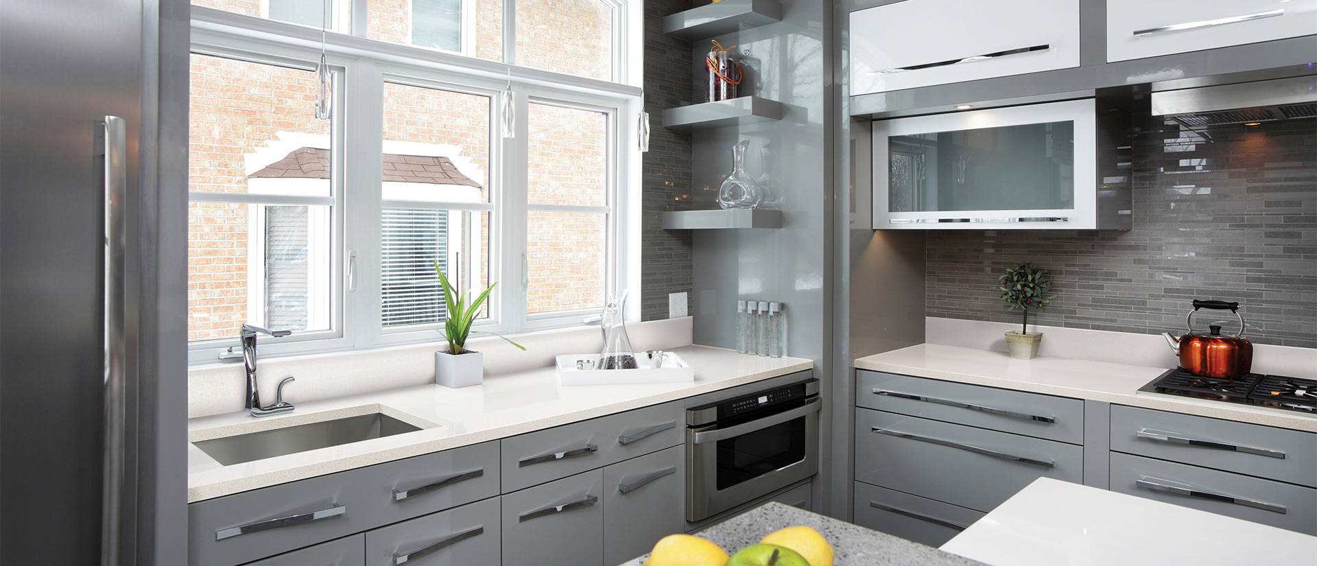 Frost White Quartz countertop in a modern and elegant kitchen