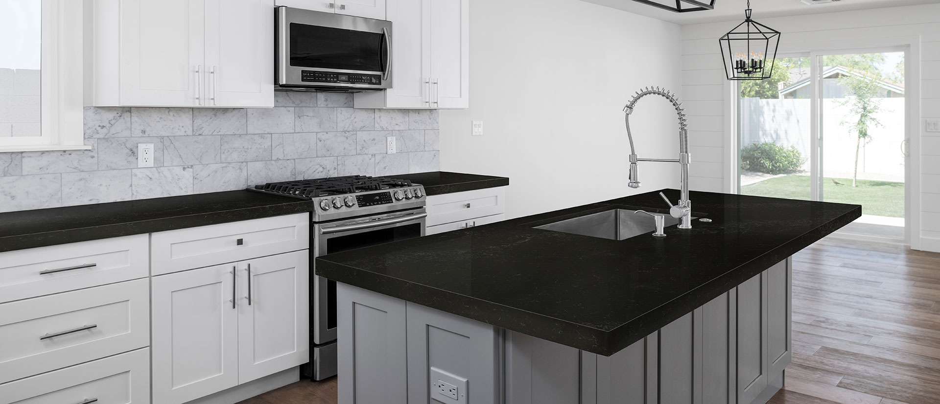Midnight Corvo Concrete Quartz countertop in a modern kitchen