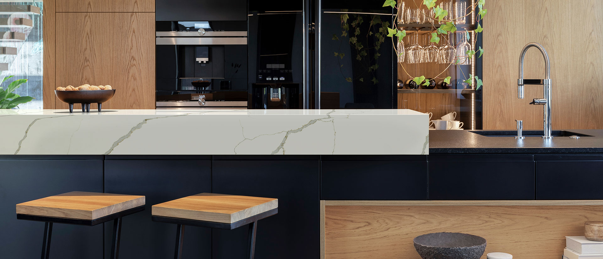 New Calacatta Laza Gold Quartz countertop in a modern and chic kitchen