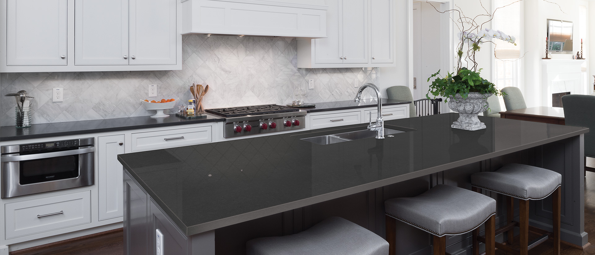 Shadow Gray Quartz countertop in a cozy and intimate kitchen