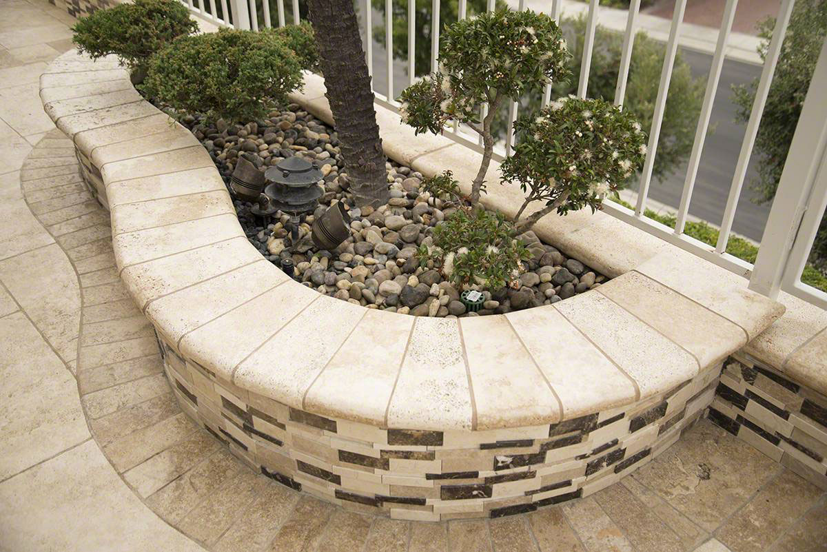 Asteria Blend interlocking 3D Polished Pattern and Paredon Crema Pavers and Tuscany Chocolade Pavers and Mixed Polished Beach Pebbles Room Scene