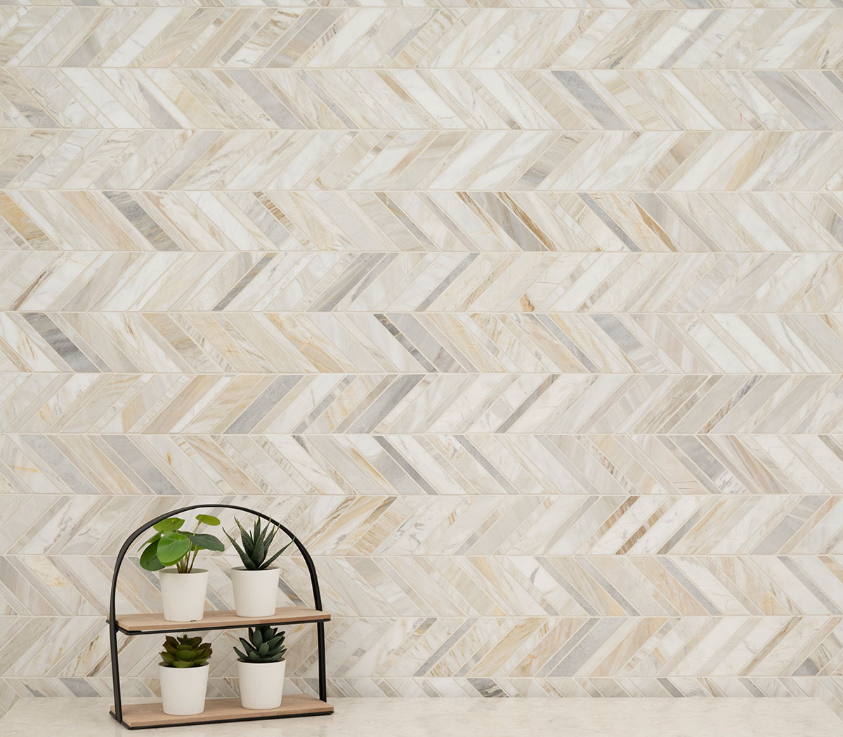 Athena Gold Chevron Pattern Honed wall in bathroom