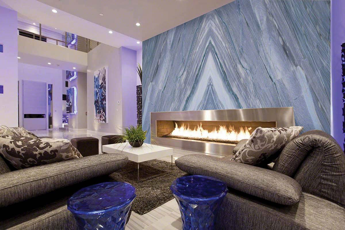Bookmatched Azul Imperiale Quartzite Wall surrounding a fireplace.