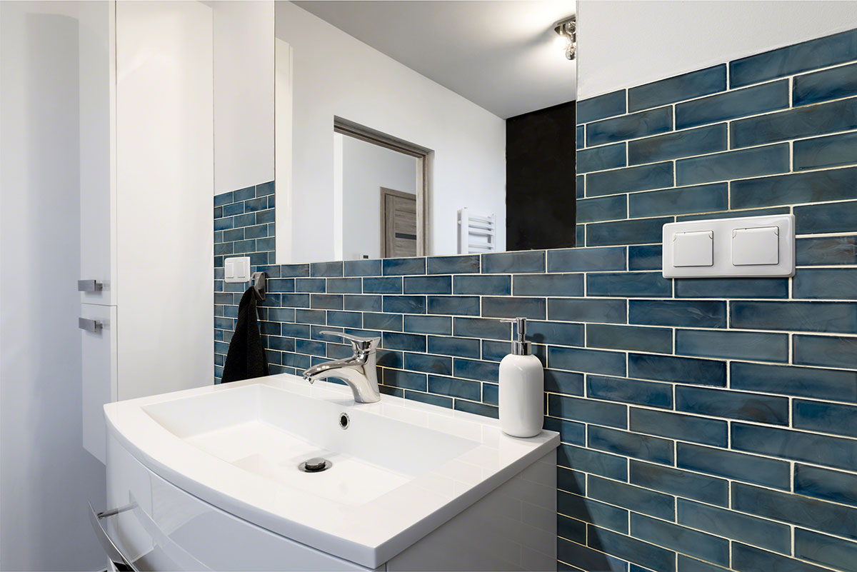 Blue Shimmer Glass Subway Tile wall in bathroom
