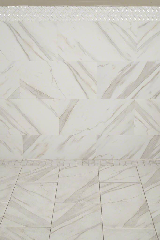 Calacatta Pietra Porcelain_Whisper White Arched Herringbone 8mm A Room Scene