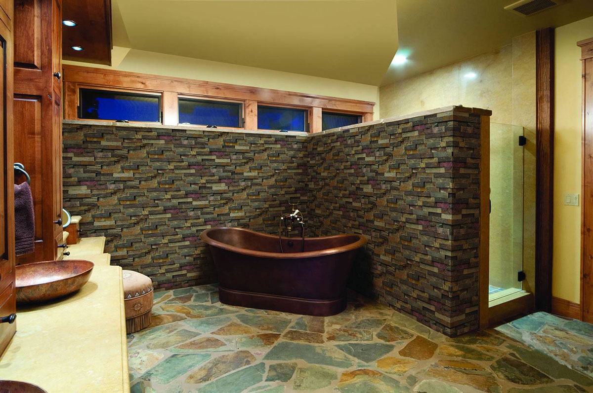 California Gold Stacked Stone wall in bathroom