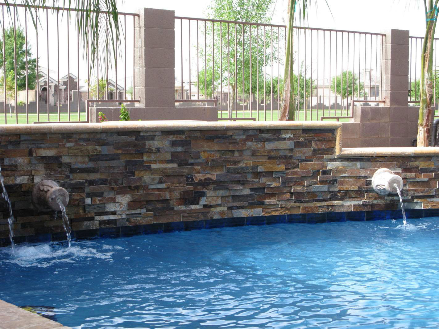 California Gold Stacked Stone wall in swimming pool