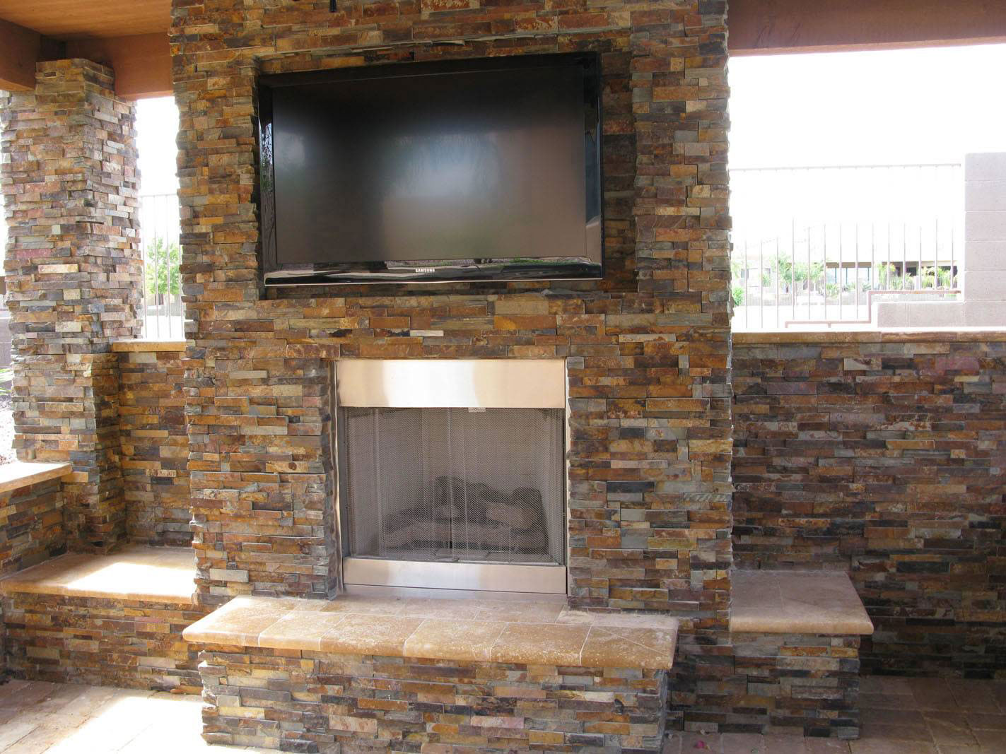 California Gold Stacked Stone wall near fireplace