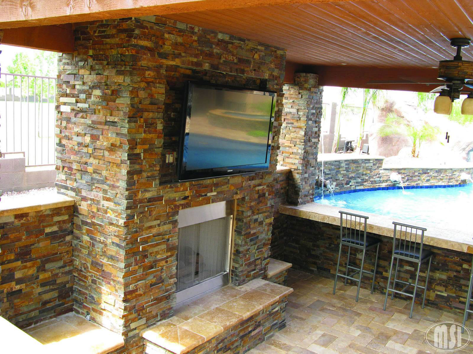 California Gold Stacked Stone wall near fireplace 2