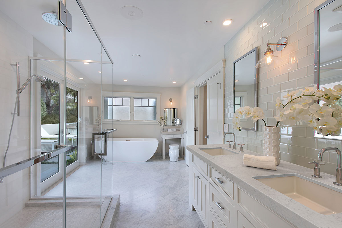 White Carrara Marble Tile Floor in Bathroom