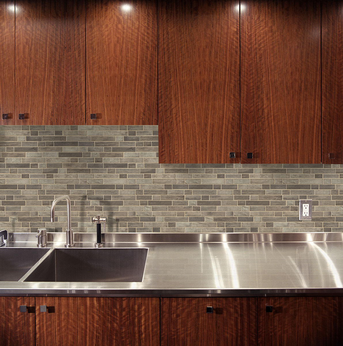 Driftwood Interlocking Glass Tile backsplash in kitchen