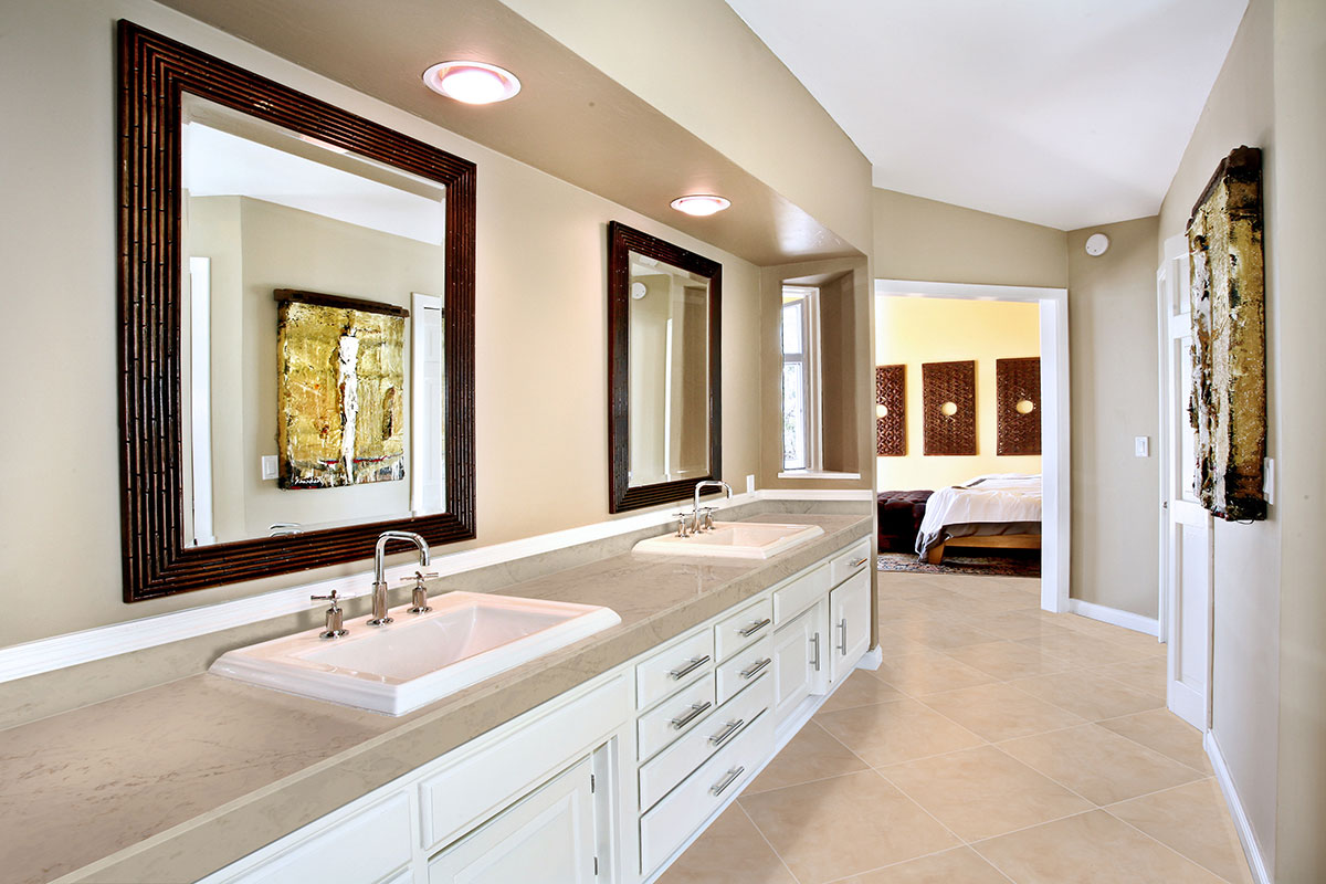 Durango Cream Travertine Countertop and Floor in Bathroom
