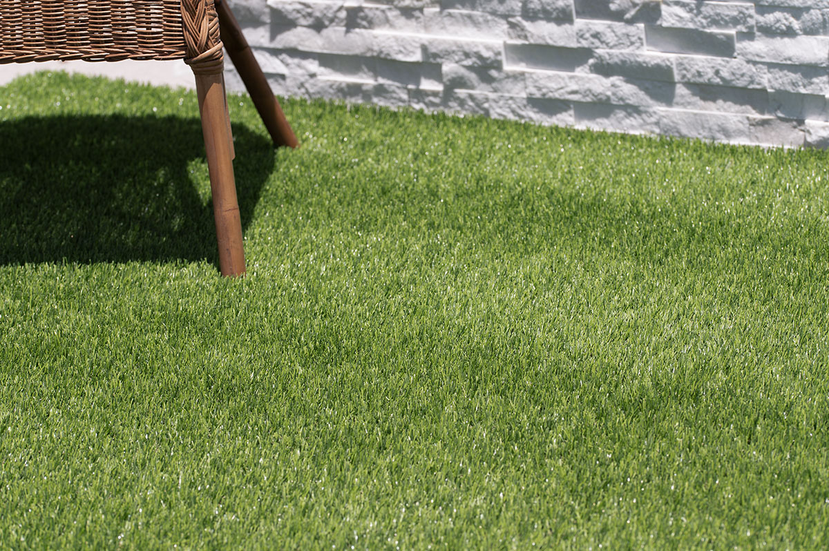Evergrass™ Emerald Green Turf 110 lawn with outdoor chair