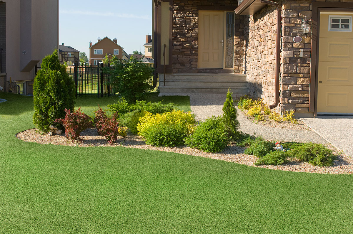 Evergrass™ Emerald Green Turf 76 lawn in front yard of home