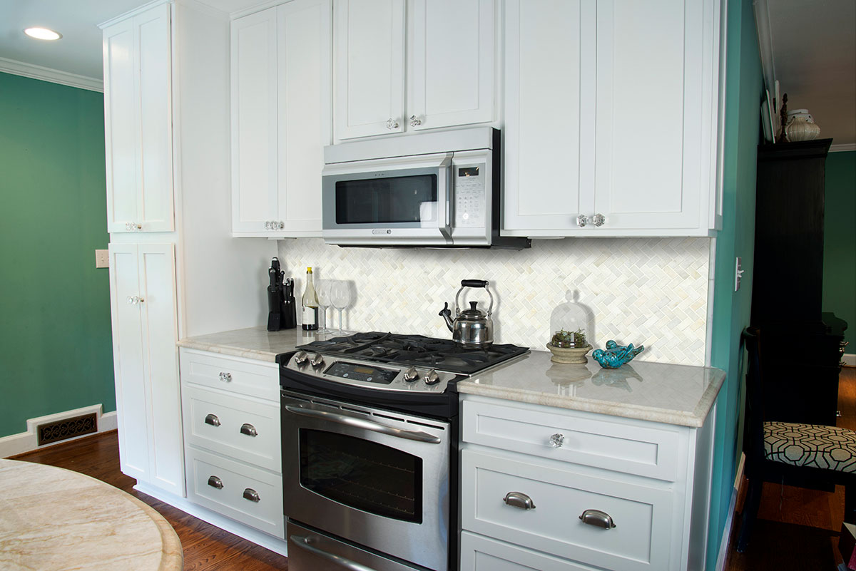 Greecian White Herringbone Pattern backsplash tile in kitchen