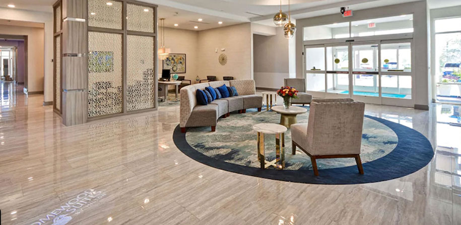 Hospitality flooring in hotel lobby Pietra Venata White Room Scene