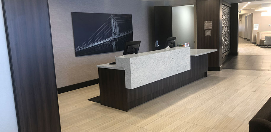 Flooring and countertops in hotel reception area Rolling Fog Room Scene