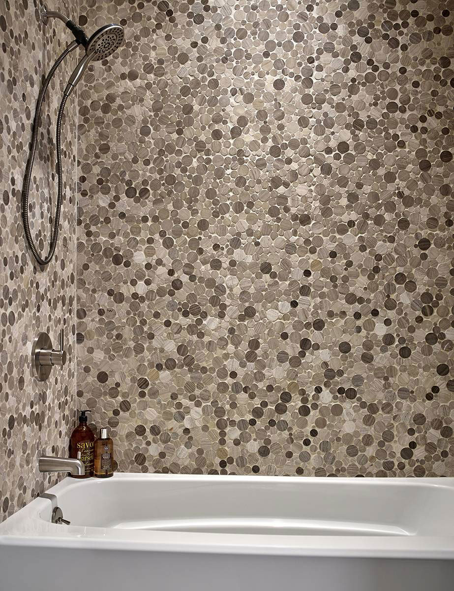 Serenity Stone Pebble Mosaic wall in bathroom