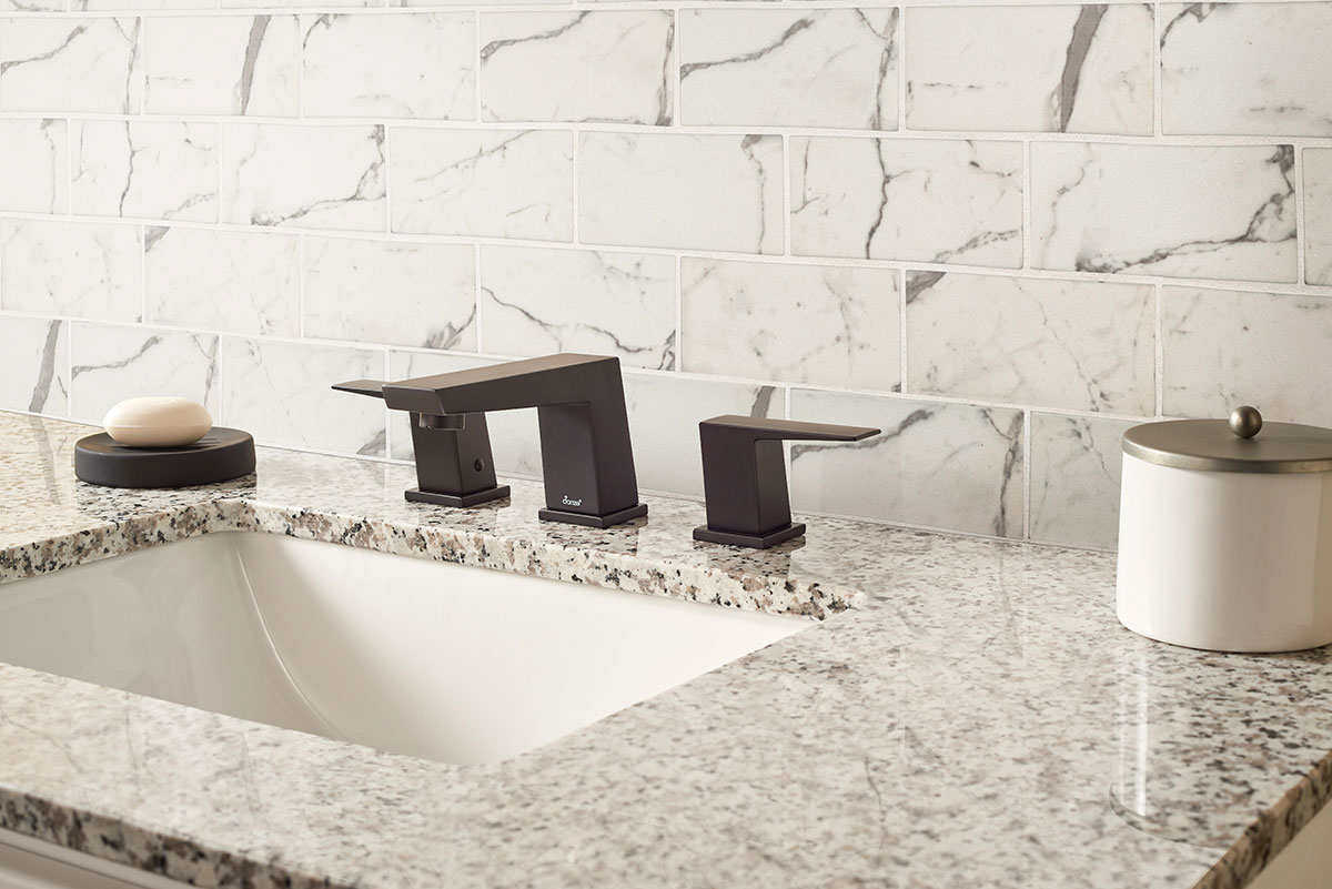 Statuario Celano Glass Tile 3x6 backsplash in bathroom