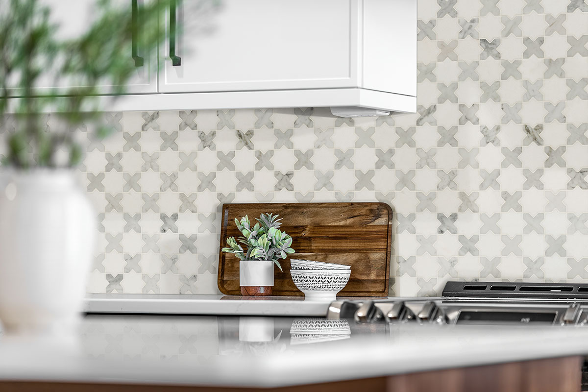 Vera Anne Pattern Polished backsplash tile in kitchen