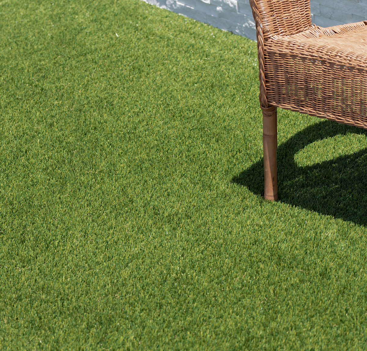 ="Evergrass™ Viridian Turf 91 lawn with outdoor chair