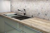 Angora Polished 2" Hexagon Mosaic Tile backsplash in kitchen