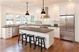 Arabescato Carrara Herringbone Pattern backsplash tile in kitchen