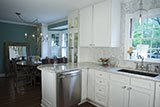 Arabescato Carrara Herringbone Pattern backsplash tile in kitchen