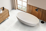 Bianco Dolomite Dotty Polished Tile flooring in Bathroom