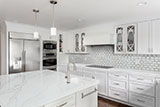 Bianco Dolomite Lynx Polished Glass Tile Backsplash in kitchen