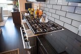 Ice Bevel Glass Tile 4x12 backsplash in kitchen