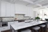 Silver Canvas Interlocking Tile backsplash in kitchen