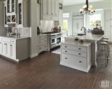 Arabescato Carrara Herringbone Pattern backsplash tile in kitchen