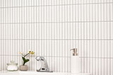 White Matte 1x6 Stack Pattern wall in bathroom